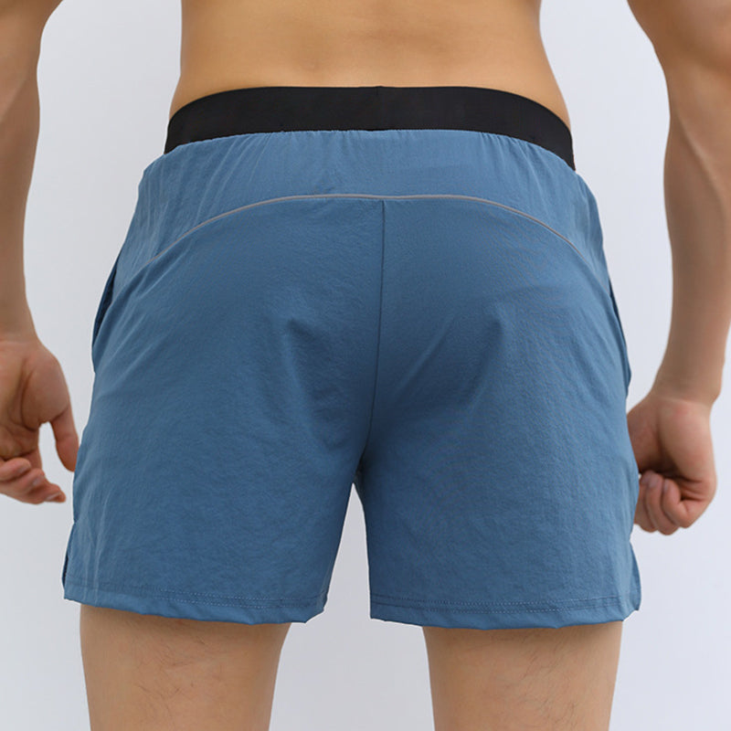 Shorts de sport pour hommes à taille élastique avec poches (soie glacée respirante)