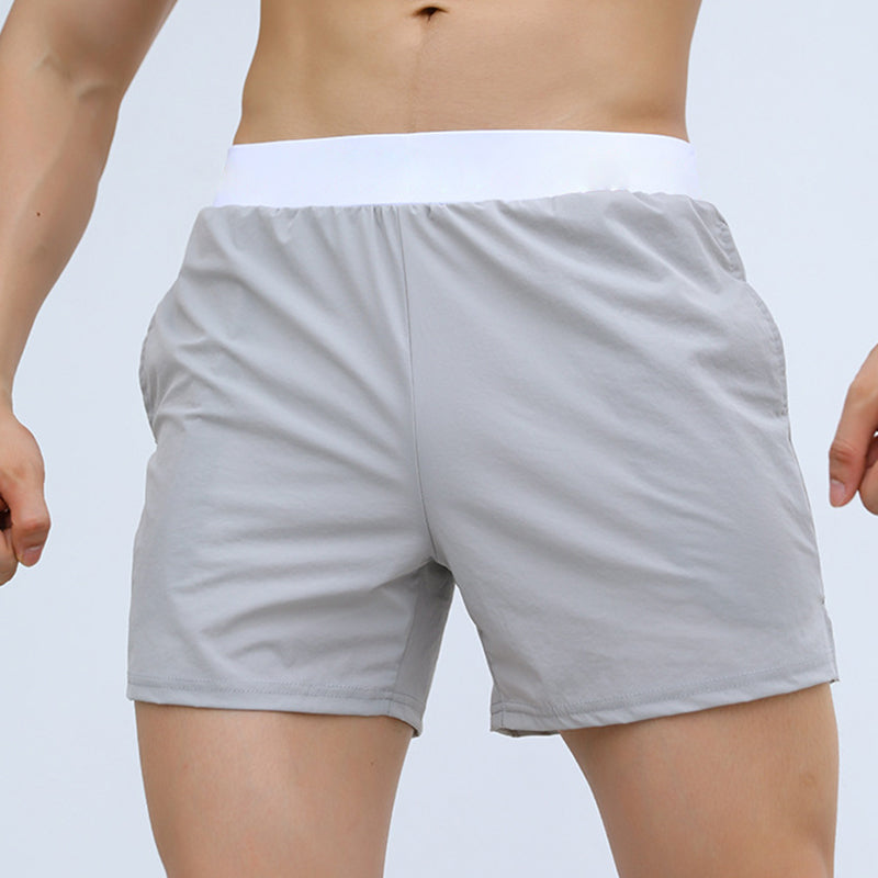 Shorts de sport pour hommes à taille élastique avec poches (soie glacée respirante)